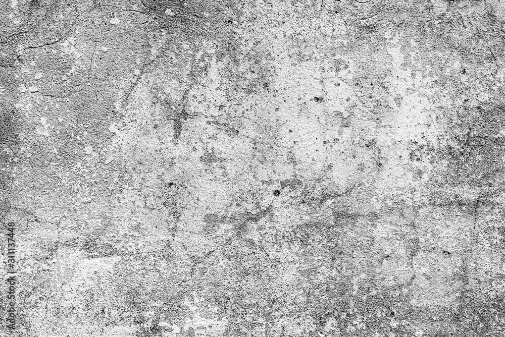 Fototapeta premium Texture of a concrete wall with cracks and scratches which can be used as a background