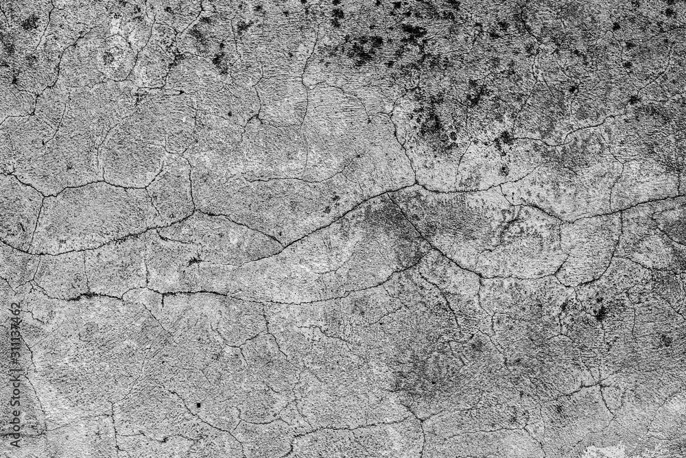 Obraz premium Texture of a concrete wall with cracks and scratches which can be used as a background