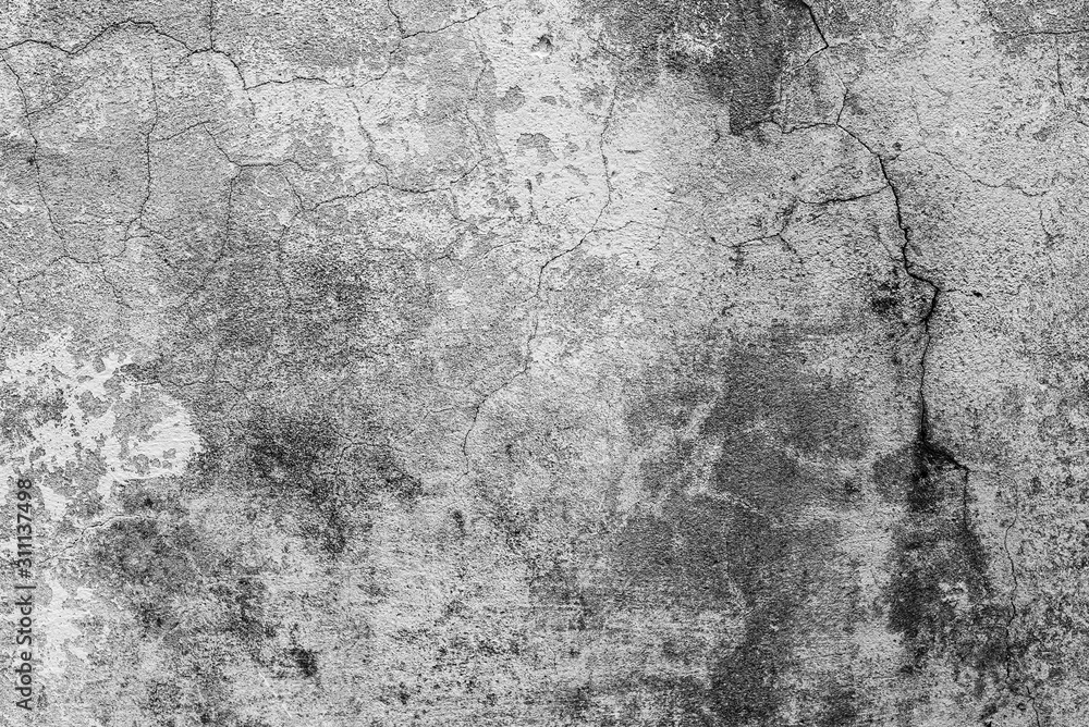 Fototapeta premium Texture of a concrete wall with cracks and scratches which can be used as a background