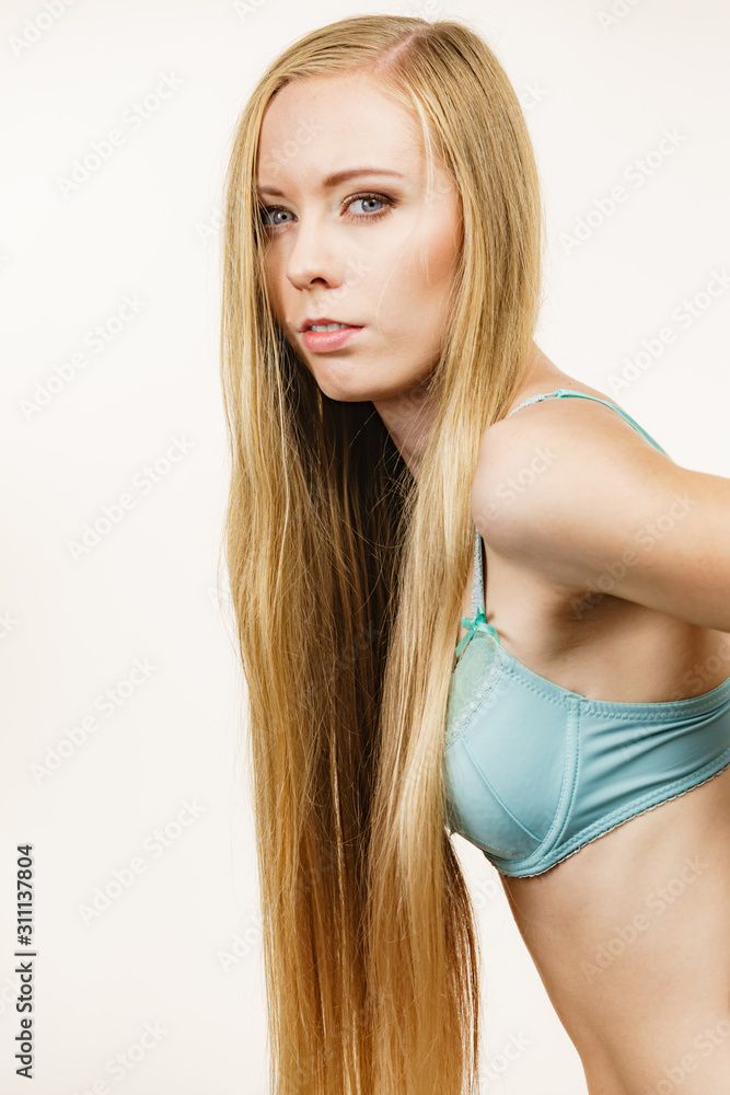 Woman small breast wearing bra Photos | Adobe Stock