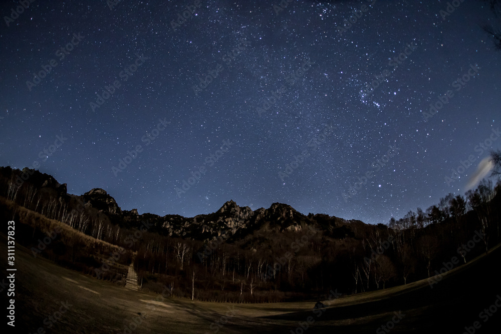 月光に照らされた瑞牆山と冬の星空 Stock Photo Adobe Stock