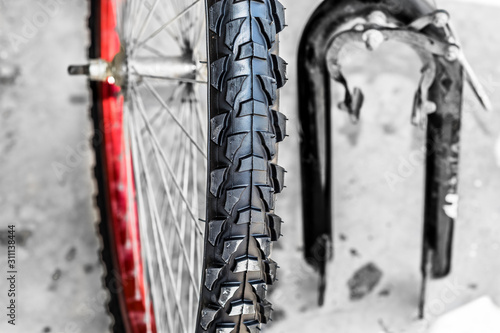closeup of new shining black mountaineer tire 