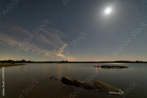 Night landscape with moon in the swamp of Valdesalor. Extremadura. Spain. photo