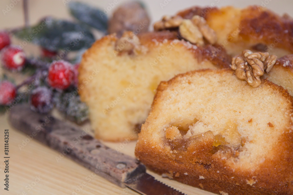 Sweet Christmas dessert with nuts and orange Sweet Christmas dessert with nuts and orange