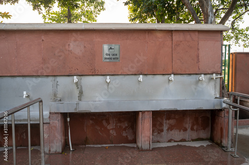 Drinking water station for tourists visiting Raj Ghat, the burial site of Mahatma Gandhi in New Delhi India