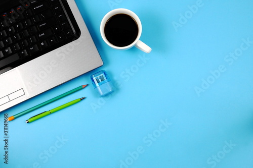 Business background with cup of coffee and pen.