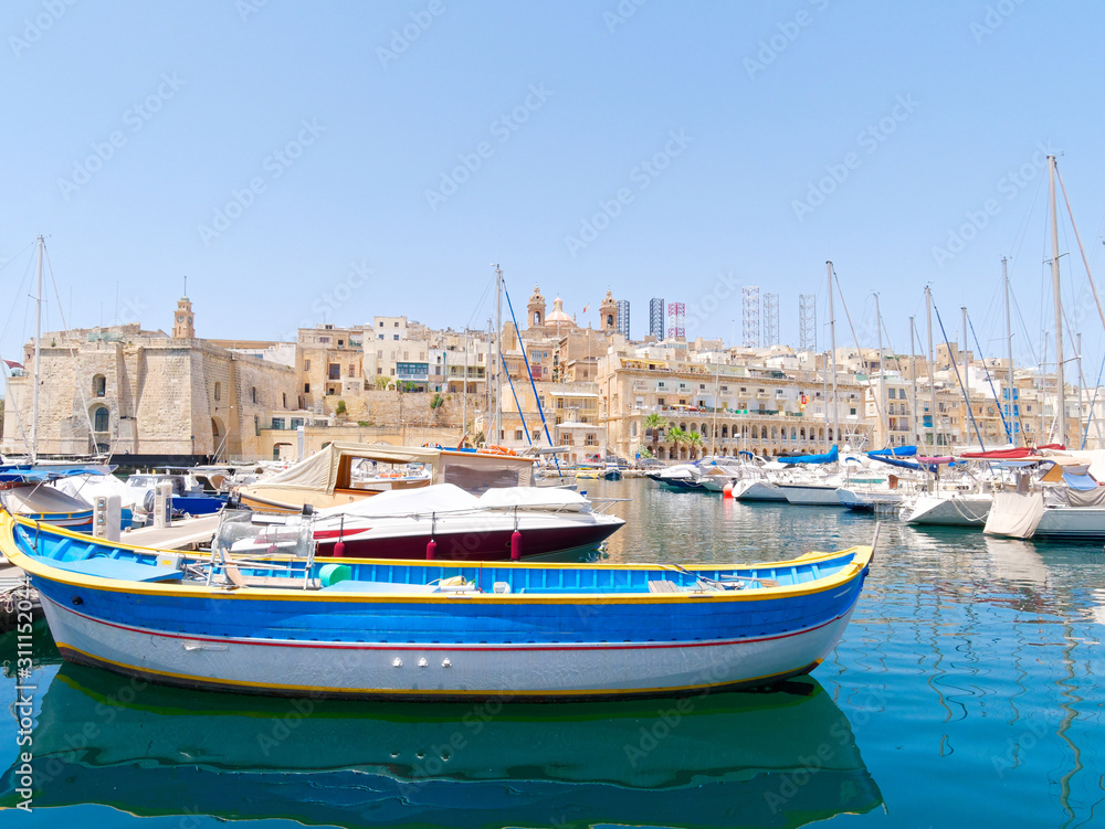 Beautiful old town in Isla. Next to it is a magnificent port. Malta