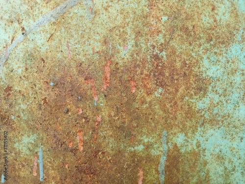 A close up of rust on wall