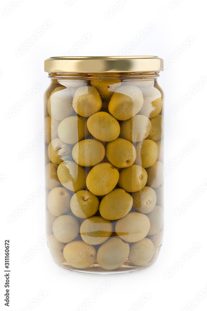 a glass jar filled with olives a glass jar filled with olives