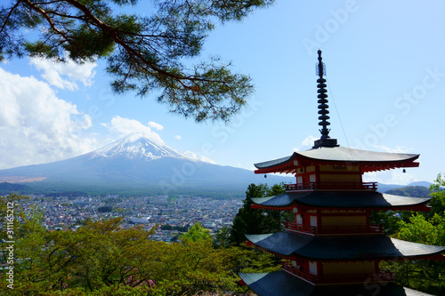 Fujiyoshida   Japan - May 02 2019  Red Chureito pagoda and Mountain Fuj