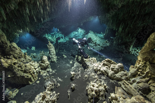 A DPV cave diver swims in the Hatzuts Aktun cenote (Mexico) © Дмитрий Ефремычев