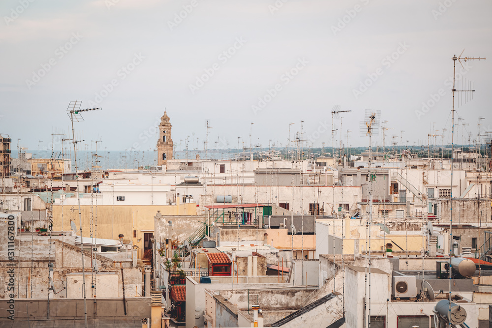 MOLA DI BARI, ITALY / AUGUST 2018 : View of the old town from the roof tops