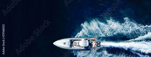 Valokuva Aerial drone ultra wide panoramic photo of high speed inflatable rib boat cruisi