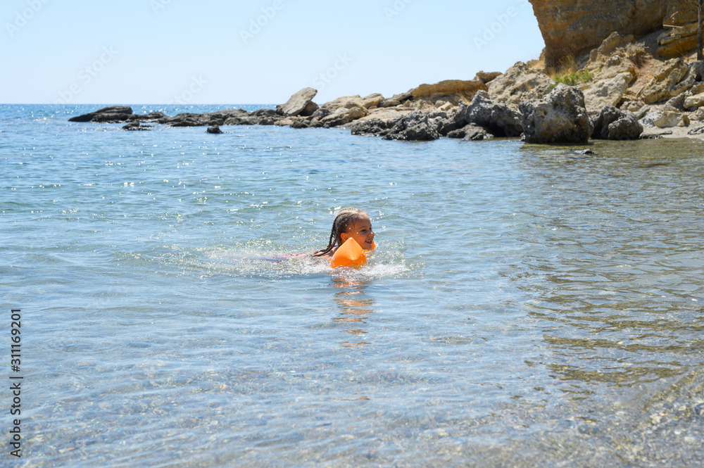 little girl having fun at summer vacation in sea little girl having fun at summer vacation in sea