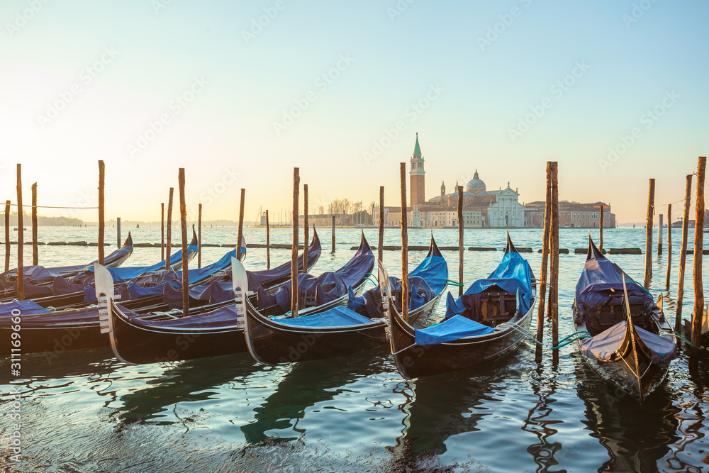 Sunrise at Venice with gondola and island of st george view