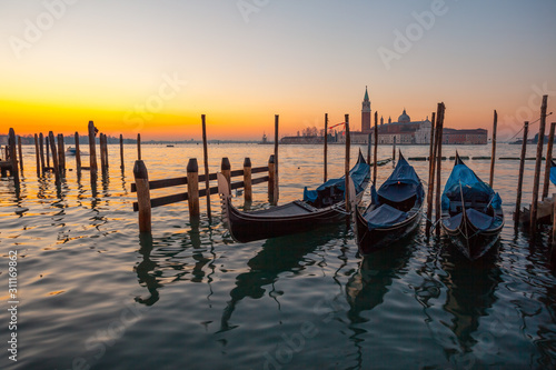 Sunrise at Venice with gondola and island © k_samurkas