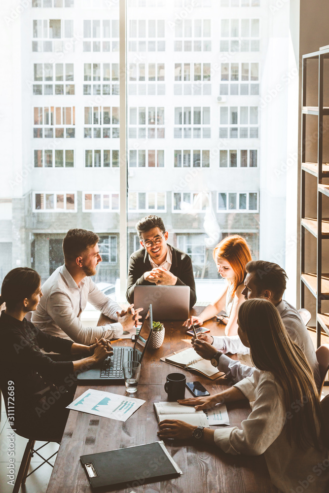 Translation company employees discussing a project