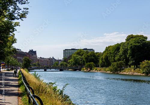 A calm summer day by the canal that runs through the inner city of Malmö, Sweden