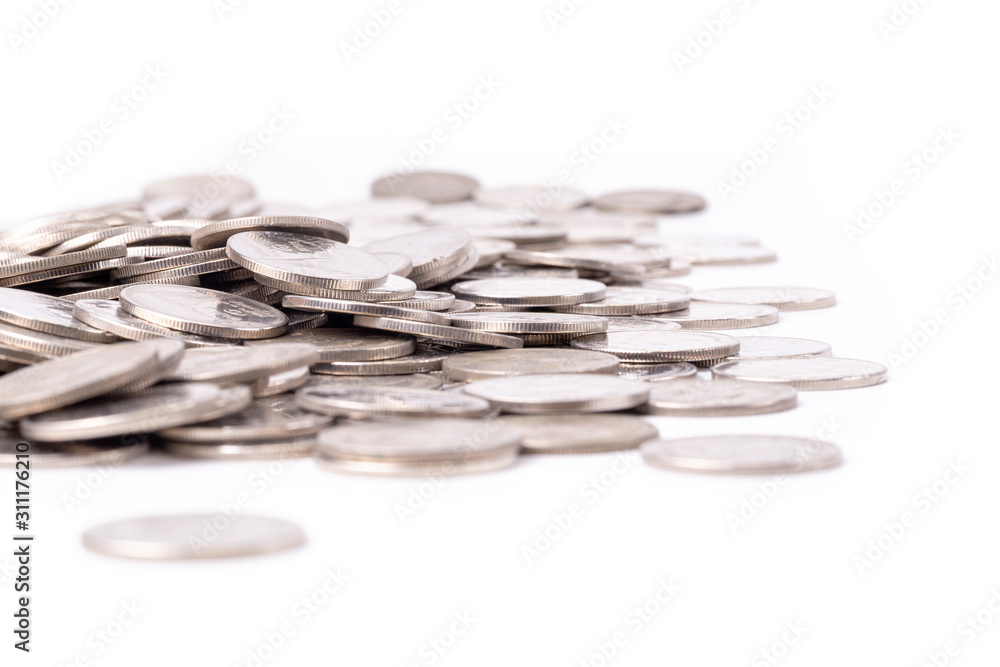 A group of silver coin shallow focus on white background A group of silver coin shallow focus on white background