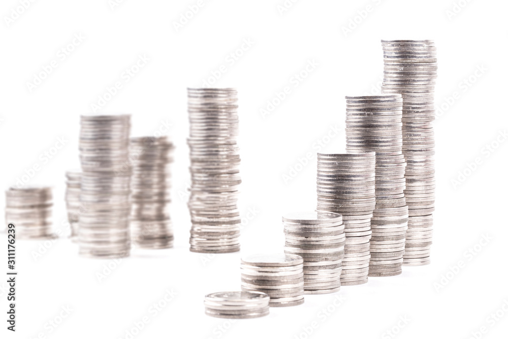 A group of silver coin set in form of growth graph shallow focus A group of silver coin set in form of growth graph shallow focus