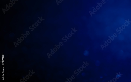 blue Abstract glitter bokeh on black background