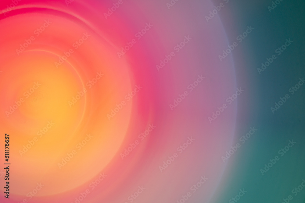 Obraz premium An abstract colored macro photograph using a long exposure and intentional camera movement to create a spiral pattern