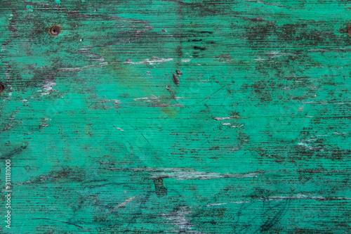 Wooden texture with scratches, stains and shabby paint