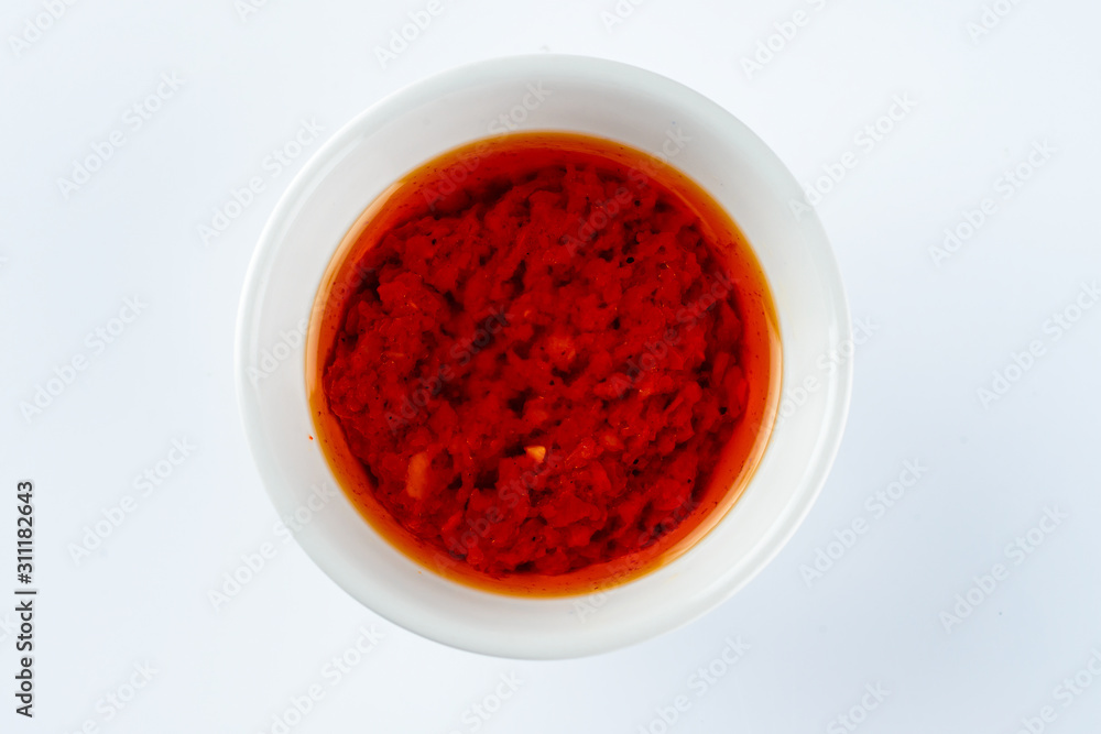 red hot chilli sauce isolated on a white background red hot chilli sauce isolated on a white background