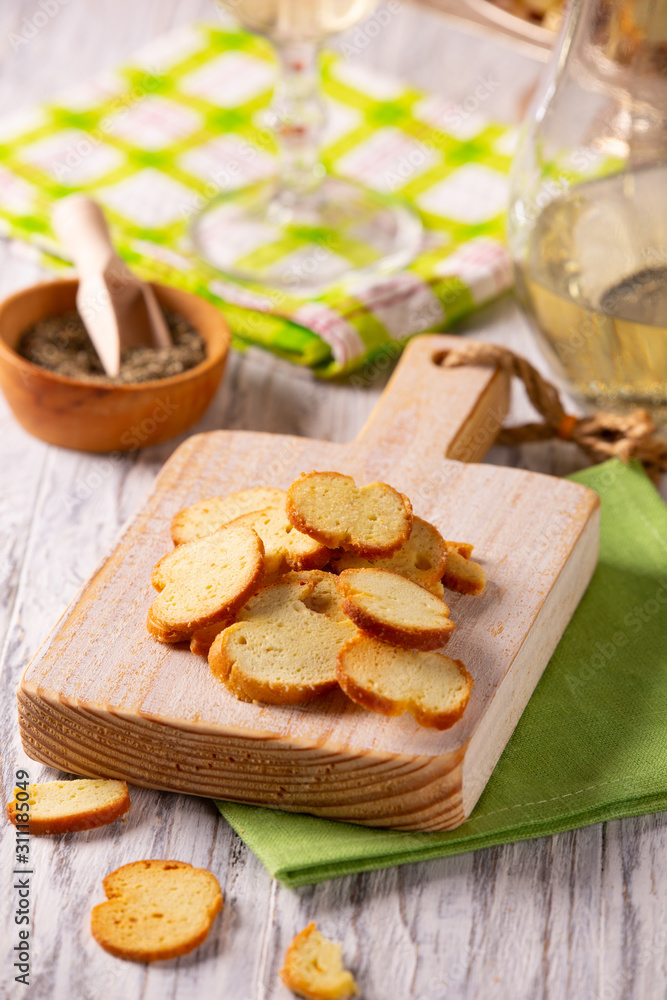 Tasty crackers on a cutting board on the table Tasty crackers on a cutting board on the table