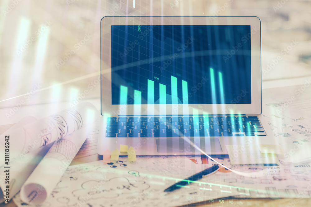 Forex Chart hologram on table with computer background. Double exposure. Concept of financial markets.