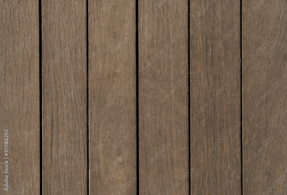 Design background made of wood. Vertical brown planks. New blank of wooden texture. Design background made of wood. Vertical brown planks. New blank of wooden texture.