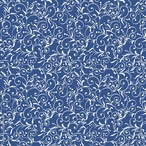 white curly swirl pattern on classic blue background