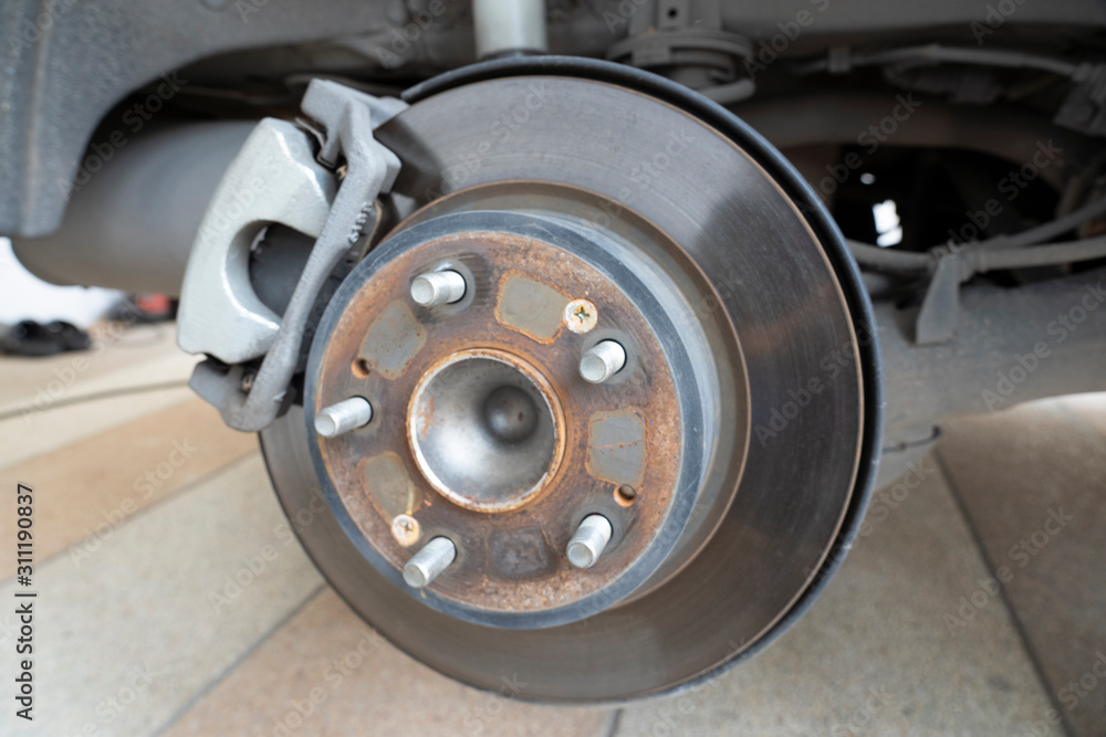 Back Disk Brake Assembly Repair. Home delivery tires service. 