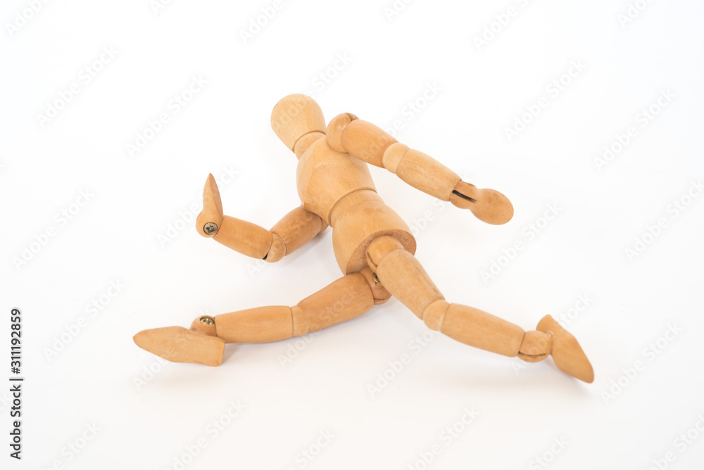 Wooden figure pose running on white background isolated object Wooden figure pose running on white background isolated object