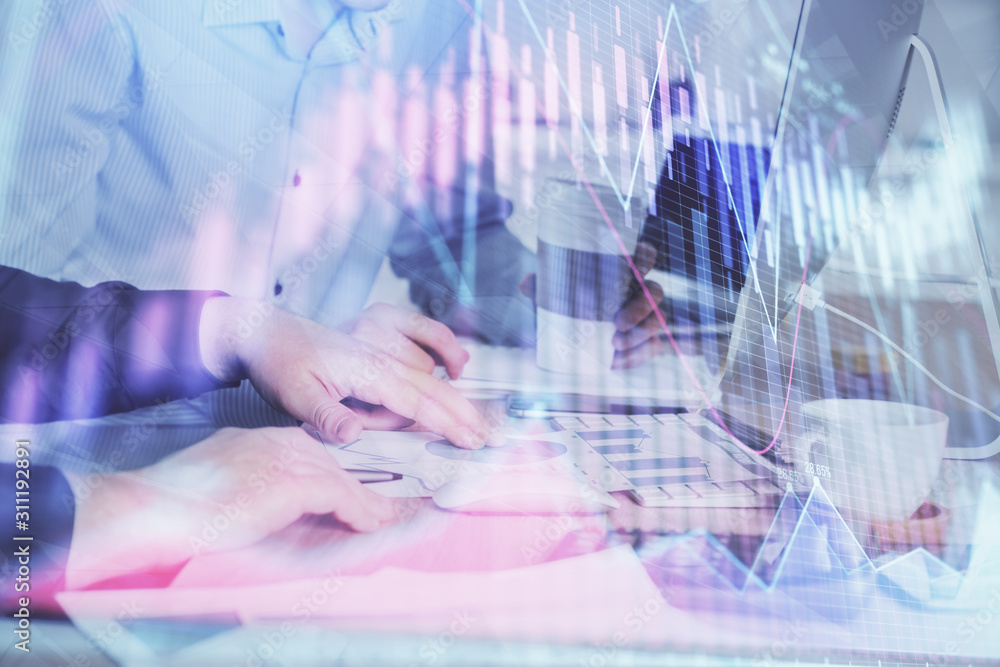 Multi exposure of chart with man typing on computer in office on background. Concept of hard work. Multi exposure of chart with man typing on computer in office on background. Concept of hard work.