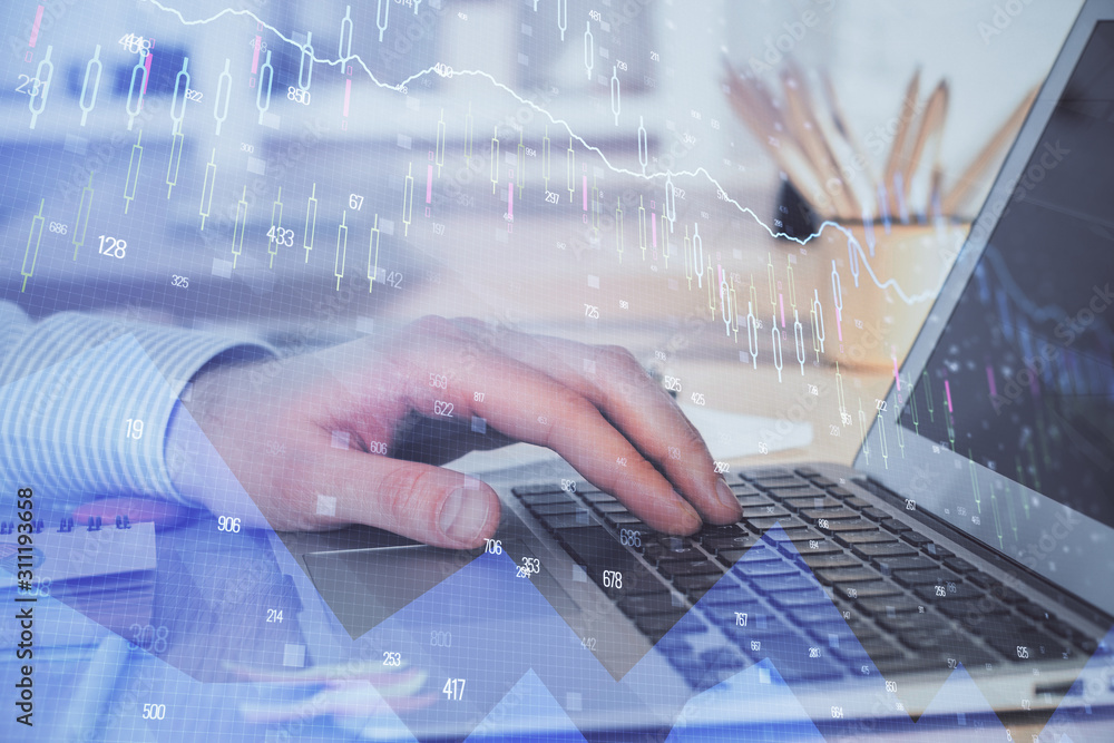 Double exposure of forex chart with man working on computer on background. Concept of market analysis. Double exposure of forex chart with man working on computer on background. Concept of market analysis.