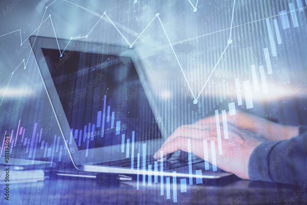 Double exposure of forex chart with man working on computer on background. Concept of market analysis. Double exposure of forex chart with man working on computer on background. Concept of market analysis.