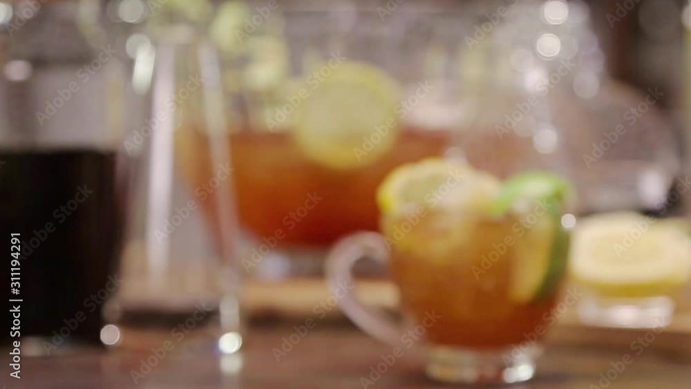 Cold Drink with Apple Garnish and Lemon - Pull Focus Cold Drink with Apple Garnish and Lemon - Pull Focus