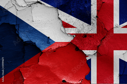 flags of Czech Republic and UK painted on cracked wall