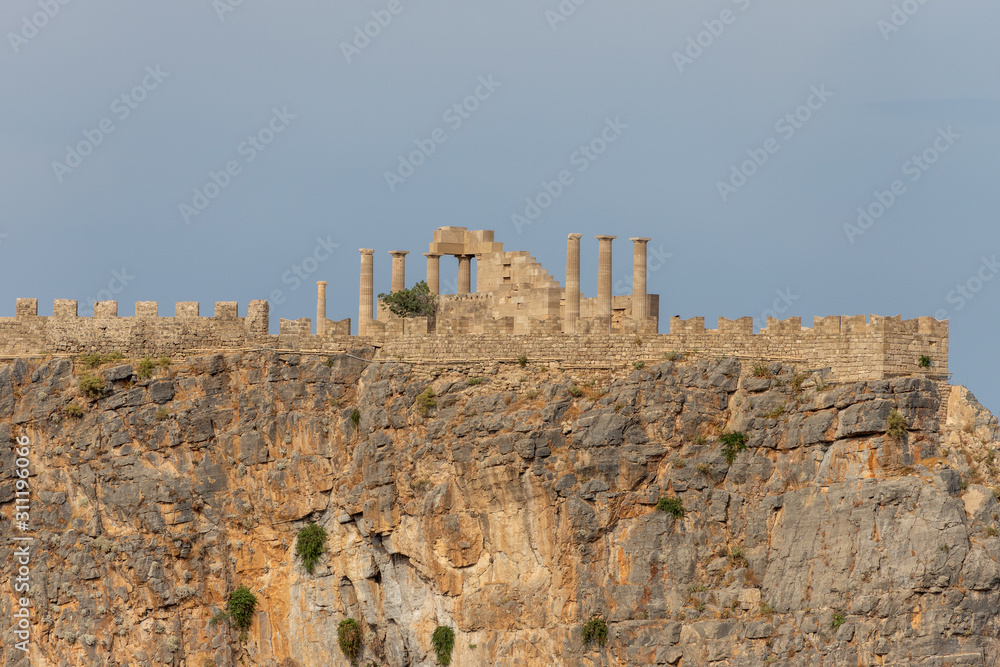 Close-up of the antique Acropolis of Lindos on Greek island Rhodes on a sunny day in spring