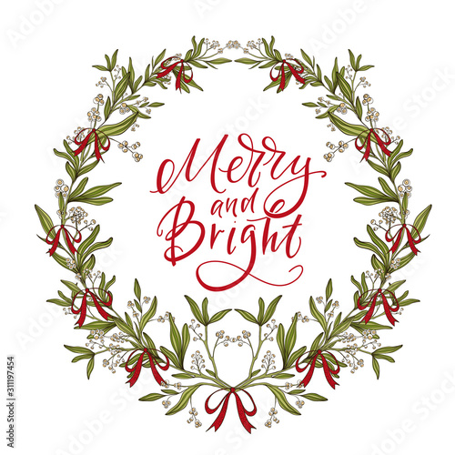 Christmas wreath made of mistletoe and red ribbons