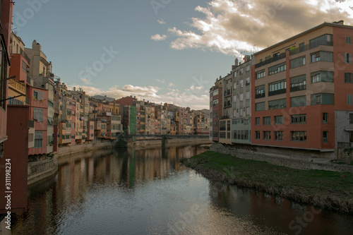 Colorful houses besides the banks of Riu Onyar, between the old town and the center of Girona (Spain). © David J Vidal