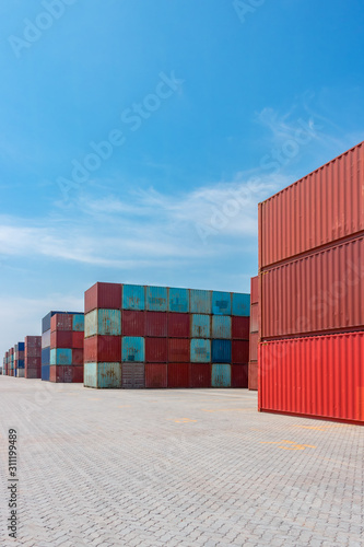 Containers on the wharf. International shipping logistics.