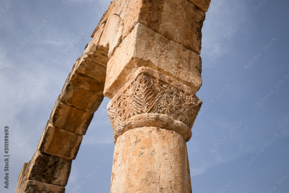 Detail of a capital of a column. The ruins of the Umayyad city of Anjar. Beqaa Valley, Lebanon - June, 2019