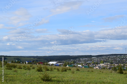 landscape with houses and blue sky