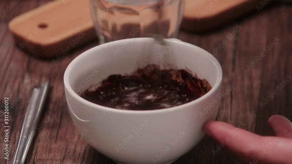 Stirring Chocolate With an Iron Stirrer - Close Up Stirring Chocolate With an Iron Stirrer - Close Up
