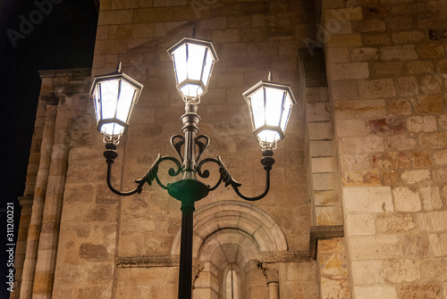 Old streetlight in the medieval village of Zamora photo