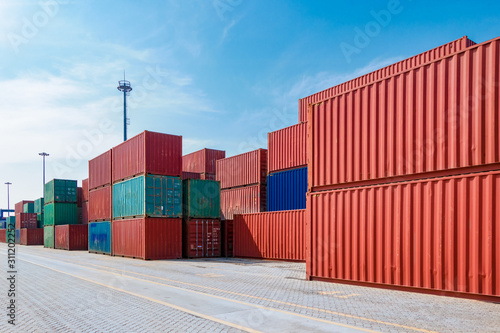 Containers on the wharf. International shipping logistics.