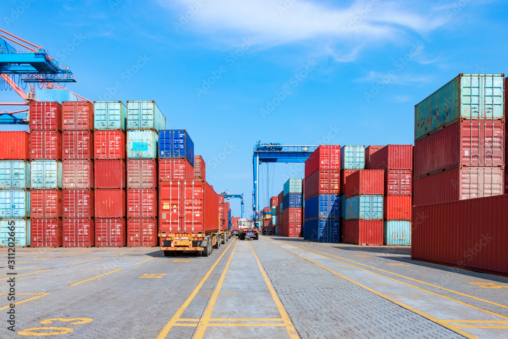 Containers on the wharf. International shipping logistics. Containers on the wharf. International shipping logistics.