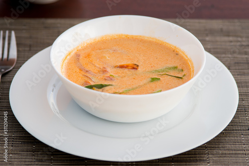 Thai soup Tom yam served outdoors